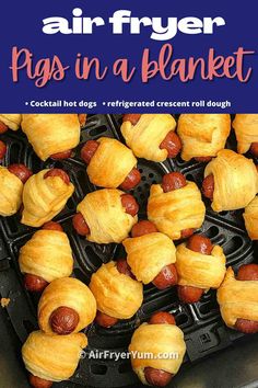 an air fryer filled with pigs in a blanket