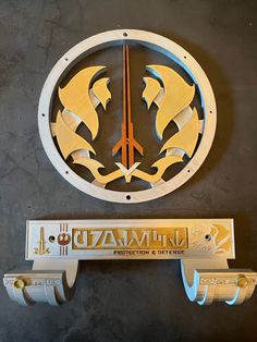 a clock with two dolphins on it and the word savannah written in gold above it