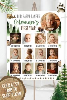 a baby's first year calendar hanging on a wall next to a christmas tree