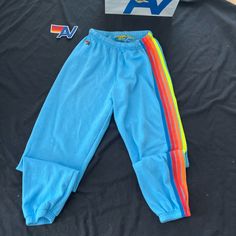 New With Tag Aviator Nation 5 Stripe Sweatpants In Sky// Neon Rainbow In A Size Medium These Are Sold Out! They Retail For $156 Also Included Are Stickers, A Koozie Cup And An Aviator Nation Shopping Bag. Pet And Smoke Free House Thanks So Much For Looking. Fitted Blue Pants For Streetwear, Sporty Multicolor Long Pants, Sporty High Waist Multicolor Bottoms, Sporty High Waist Blue Pants, Sporty High-waist Blue Pants, Blue Fitted Sweatpants For Streetwear, Fitted Blue Sweatpants For Streetwear, Winter Fits Preppy, Aviator Nation Outfit