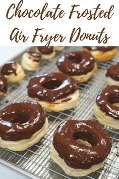 chocolate frosted air fryer donuts on a cooling rack with text overlay