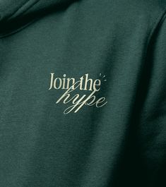 the back of a green sweatshirt with white lettering that reads join the hope on it