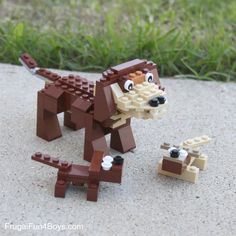 a lego dog and its toy are on the ground