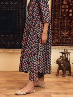 Get spring with subtle pintucks detailing, flowy kurta paired with matching pants sets. This is a set of 2. Color: Blue Fabric: Cotton Note: Length and sizes can be customised Length - Kurta 45 inches Pants 36 inches Available in other colors The product will be delivered within 2-4 weeks of order placed Wash Care - Dry clean only This set does not include dupatta. Size Chart- SIZE BUST WAIST HIP US&CAN UK&AUS XXS 32" 30" 32" 4 8 XS 34" 32" 34" 6 10 S 36" 34" 36" 8 12 M 38" 36" 38" 10 14 L 40" 3 Ankle-length Kalamkari Print Kurta For Eid, Ankle-length Kalamkari Kurta For Eid, Eid Ankle-length Kalamkari Kurta, Festive Cotton Kurta With Pintucks, Ankle-length Block Print Kurta For Navratri, Eid Straight Kurta With Pintucks, Eid Pintucks Straight Kurta, Cotton Straight Kurta With Pintucks, Blue Block