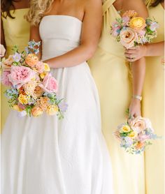 three bridesmaids in yellow dresses holding bouquets with flowers on the bottom row