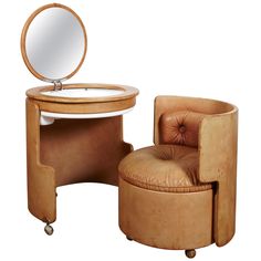 a chair and mirror sitting next to each other