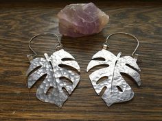 Leaf earrings Monstera hoop earrings tropical leaf by AdrianaSoto Handmade Leaf-shaped Metal Jewelry, Handmade Metal Leaf Jewelry, Handmade Leaf-shaped Metal Earrings, Handmade Metal Leaf-shaped Earrings, Handmade Metal Leaf-shaped Jewelry, Silver Leaf-shaped Brass Earrings, Monstera Leaf Earrings, Leaf Ornament, Mixed Metal Earrings