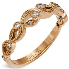 a gold ring with diamonds on it