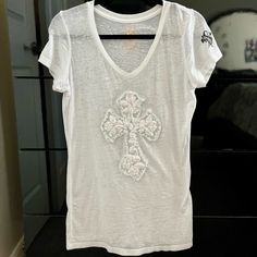 Buckle Tops | White Sheer Rhinestone Studded Maltese Cross Detail T-Shirt - Size Xl Brand New Condition; Never Worn **Smoke & Pet Free Home White Distressed Fitted Tops, White Fitted Distressed Tops, Fitted White Distressed Tops, Fitted Distressed White T-shirt, Fitted White Distressed T-shirt, White Bohemian V-neck T-shirt, Buckle Top, Maltese Cross, Rhinestone Studs