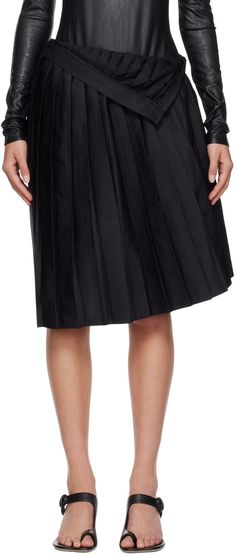 Polyester- and cotton-blend twill skirt. Knife pleats throughout. · Button fastening at waistband · Elasticized webbing trim at waist · Concealed zip closure at side seam · White stitching at back waistband Supplier color: Black Knife Pleated Skirt, Black Pleated Midi Skirt, Twill Skirt, Knife Pleat, Knife Pleats, Mid Length Skirts, Mm6 Maison Margiela, Pleated Midi Skirt, Black Skirt