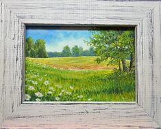 a painting of a field with trees and flowers in the foreground, painted in white frame