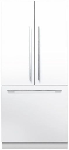 a white refrigerator freezer sitting inside of a kitchen