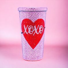 a cup that has some kind of heart on it