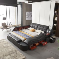 a modern day bed with storage underneath it