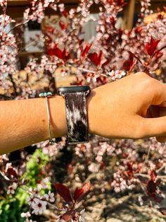 Stand out from the herd with our Black & White Cowhide Watch Band. Made from genuine cowhide, this band is designed to bring a touch of western flair to your Apple Watch It fits 38mm/40mm/41mm Hides will vary in print, cowhide products are made to be handled with care, shedding of hair is natural THIS ITEM IS FINAL SALE Western Apple Watch Bands, Apple Watch Cuff, Cuff Watch, Cow Hide, Watch It, Apple Watch Band, Beaded Choker, Custom Items, Apple Watch Bands