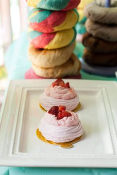 there are many desserts on the table ready to be eaten