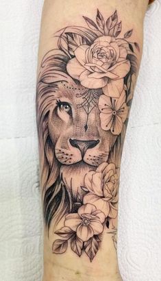 a lion with flowers on its head and some leaves around it