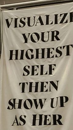 a sign that says visualize your highest self then show up as her