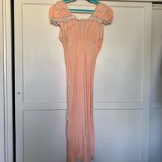 Beautiful And In Good Condition, Slight Wear In A Few Spots But Minimal All The Detail And Quality You Expect From That Era, Delicate, Embroidered With Ribbon Detail Peach Pink Color W A White/Silver Detail On Ribbon And Embroidery Please See Measurements Will Fit Small/Medium Peach Pink Color, Peach Pink, Embroidery Details, White Silver, Vintage Pink, Pink Grey, Women's Intimates, Pink Color, Vintage Ladies