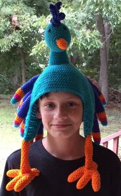 Ahh, the proud peacock. Who wouldn't want one to keep their head and ears warm? This pattern includes: - Step by step instructions in U.S. terminology- Photos to help you make your creation come to life- Permission to make and sell as many finished items as desired provided that design credit is given to SharpinDesigns. Please do not copy or redistribute the pattern. NOTE: This is for the PDF pattern only and not the finished item Crochet Magikarp Hat Pattern Pdf, Peacock Hat, Crochet Peacock, Peacock Crochet, Turtle Hat, Crochet Animal Hats, Crochet Hedgehog, Crafty Hobbies, Crochet Sheep