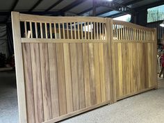 a large wooden gate in a building