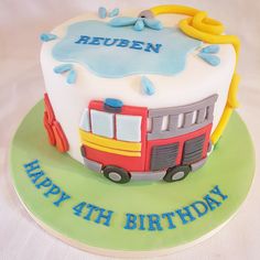 a birthday cake with a fire engine on it