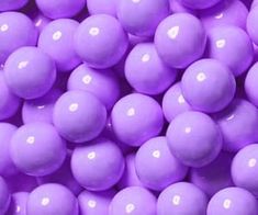 close up view of purple candy balls