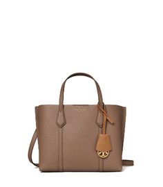 Directly from Tory Burch - Made for multi-tasking. Our Perry Small Triple-Compartment Tote Bag is made of rich Italian pebbled leather that's bonded inside - making it soft yet structured. Contrast-color details appear throughout: from the interior to the brushed gold charm. It has a center zip pocket and an optional crossbody strap. Tory Burch Official Site. Elegant Satchel With Grained Texture, Classic Bags With Grained Texture For Work, Luxury Grained Texture Bags For Work, Formal Brown Bag With Grained Texture, Elegant Grained Texture Satchel Bag, Luxury Grained Texture Work Bags, Brown Travel Bag With Grained Texture, Chic Top Handle Bag With Grained Texture, Brown Grained Travel Bag