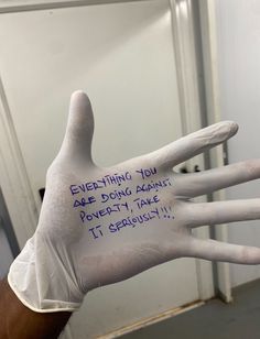 a hand with writing on it that says everything you are doing against poverty, take it seriously