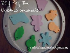 a plate that has different colored fish on it with the words diy play - doh christmas ornaments