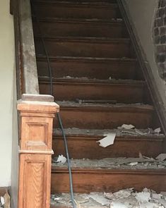 an old set of stairs that have been torn apart