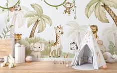 a child's room with jungle animals and trees on the wall, including a teepee tent