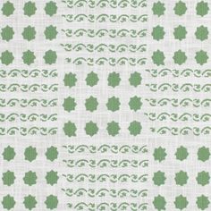 a green and white pattern on fabric