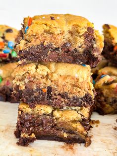 chocolate chip cookie bars stacked on top of each other with m & m candies