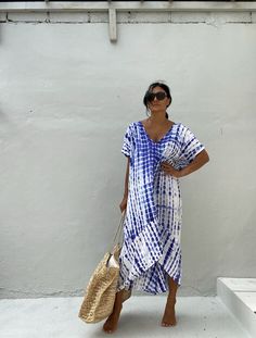 ☎️  🇲🇨s h i p p i n g 🇲🇨 Please include your phone number at the checkout in the 'Note to Seller' to assist in final delivery. 🏝Color: Notice color - blue mix purple underline Asymmetric  Dyed Vintage washing  MAXI CAFTAN DRESS 👗I recommend you wearing this on the   Beach party dress,swimming suit .👗 This dress is dyed 100% with hand Tie dyed of Indonesia Bali's unique method.  V-neck Maxi Caftan Dress This elegant and comfortable dress is easy to wear or it can be everyday comfortable very nice casual  Cut in an Oversize pattern Beautiful dress with soft fabric created by hand tie dyed  method of beautiful Indonesia. The ending part is more unique due to the decoration of conetrace. 🌴 Available Beach bag https://etsy.me/3fCk5s3 🌴Size: One size( one size all fit) loose fit USA/ S Beach Party Dress, Swimming Suit, Long Kimono, Caftan Dress, Boho Maxi, Boho Maxi Dress, Comfortable Dress, Beach Dresses, Beach Party