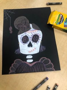 a drawing of a skeleton wearing a top hat and holding a candy bar in front of it