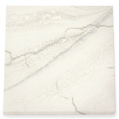 a white marble tile that looks like it could be used as a wallpaper or floor covering