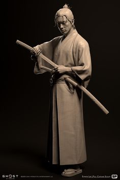 a black and white photo of a statue of a man with two swords in his hands