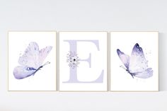 three purple and white butterfly prints with the letter e in it's upper corner