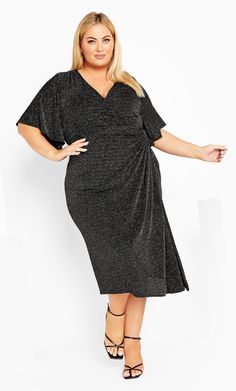 Add an elegant touch to your closet with the Viva Glam Dress. Exhibiting a V-neckline to show off your graceful curves, the faux wrap design and ruched detailing enhance your silhouette for a flattering fit. Key Features Include: - Faux V-wrap neckline - Elbow length flutter sleeves - Front twist detail - Tulip front skirt - Pull over style - All over metallic threading - Midi length Team with silver sparkly heels for a coordinated look ideal for parties. | Plus Size Dress Viva Glam In Silver | Party Dresses With Flattering Silhouette And Short Sleeves, Glamorous Short Sleeve Maxi Dress For Night Out, Short Sleeve Mini Dress With Flattering Silhouette For Party, Short Sleeve Mini Dress For Party With Flattering Silhouette, Midi Length Dress With Flattering Silhouette For Night Out, Flattering Midi Length Dress For Night Out, Dressy Short Sleeve Midi Dress For Night Out, V-neck Party Dress With Flattering Silhouette, Party V-neck Dress With Flattering Silhouette