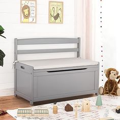 a child's room with toys and stuffed animals on the floor, including a toy chest