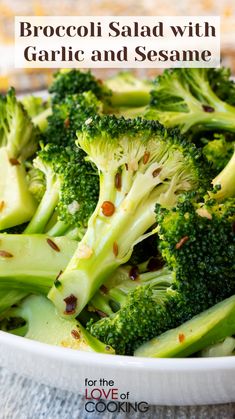 broccoli salad with garlic and sesame seeds in a white bowl on a table