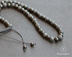 "Men's Long Necklace Natural Black Lava & Black Onyx Beaded Healing Gemstone Adjustable Macrame Necklace Gift For Him Unisex Men's Free fast shipping 3-5 business days delivered to the purchaser all necklaces -ALL THE PRODUCTS AT ELISAJEWELRYART ARE HANDMADE AND MADE WITH NATURAL BEADS. -WHAT DOES THE ONYX STAND FOR A powerful protection stone, Black Onyx absorbs and transforms negative energy, and helps to prevent the drain of personal energy. Black Onyx aids the development of emotional an Black Hand-strung Hematite Jewelry, Adjustable Hematite Necklace With Black Beads, Adjustable Beaded Obsidian Jewelry, Adjustable Onyx Necklace With 8mm Beads, Adjustable Hand-strung Black Necklaces, Adjustable Black Hand-strung Necklace, Adjustable Hand-strung Black Necklace, Black Lava Stone Round Bead Necklaces, Adjustable Black Beaded Necklaces With 8mm Beads