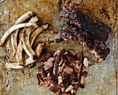 ribs and french fries on a cutting board