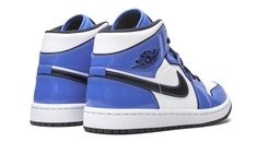 The Air Jordan 1 Mid SE “Signal Blue” dresses the mid-top version of Michael Jordan’s first signature shoe in a clean and casual look reminiscent of the popular original “UNC” colorway.  Appearing slightly darker in shade, the glossy Signal Blue leather panels on this Jordan 1 Mid nonetheless evoke the primary team uniform color of Michael Jordan’s alma mater, the UNC Tar Heels.  Smooth white leather detailing can be found on the perforated toe and on the mid-panel and collar.  Jordan Brand adds Jordan 1 Glossy, Air Jordan 1 Mid Se, Pretty Shoes Sneakers, Jordan 7, Womens Air Jordans, Air Jordan 5 Retro, Black Liner, Black Wings, Air Jordan 6