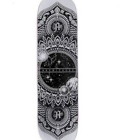 a skateboard with black and white designs on it