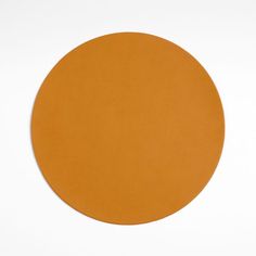 an orange circle on a white background with no one in it or someone out there