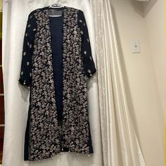 Hi, Hope You’re Doing Good. This Is A 4-Piece Never Worn, Size Medium Open Style Pakistani Formal Outfit. Fabric: Navy Blue Chiffon With Gold Zari Thread Work Embroidery On Front/Back, Grip Trouser And Silk Inner Shirt Gorgeous Outfit That Can Be Worn For Any Special Occasion! Size: Medium. Very Elegant Style With Tassels/Beads Attached. Thread Work Embroidery, Fabric Navy, Navy Blue Suit, Shalwar Kameez, Thread Work, Formal Outfit, Blue Suit, Elegant Style, Tassels