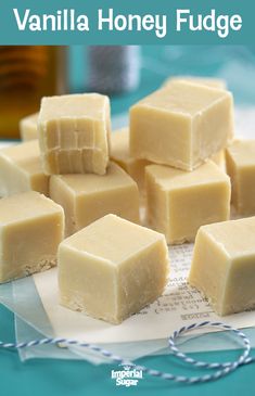 several pieces of vanilla honey fudge sitting on top of a piece of paper