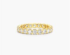 14K Yellow Gold Fishtail Diamond Eternity Ring (0.5 CTW H-I / SI1-SI2). This sculptural fishtail diamond eternity ring features scalloped settings and chevron shaped prongs that rise and secure in place a row of gleaming diamonds to create a unique and luxurious design. Number of diamonds and carat total weight will vary depending on ring size. Diamond Eternity Ring, Jewelry Photoshoot, Design Number, Eternity Ring Diamond, Luxurious Design, Diamond Eternity, Eternity Ring, Ring Sets, Women Rings